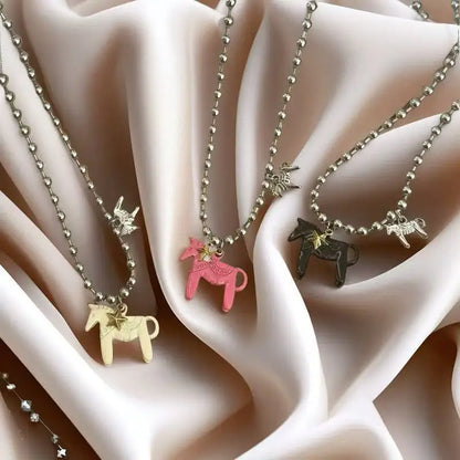 woman-man-teen-playful-animal-charm-jewelry