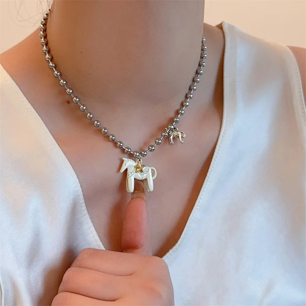 woman-man-teen-playful-animal-charm-jewelry