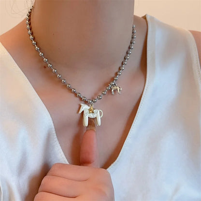 woman-man-teen-playful-animal-charm-jewelry