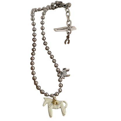 woman-man-teen-playful-animal-charm-jewelry